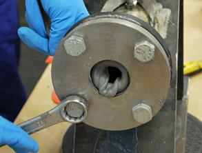 Tightening the former to the flange face surface