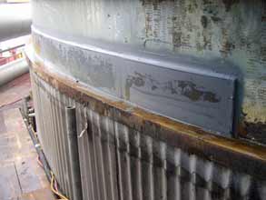 Plate bonded onto the tank usine Belzona 1111 (Super Metal)