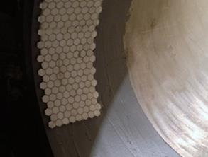 Alumina tiles bonded to the prepared surface