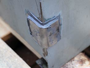 Close up view of the oil sump repair