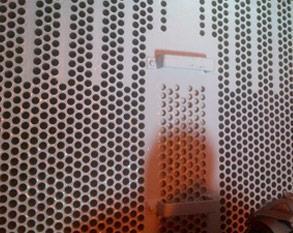 Condenser tubesheet repaired using Belzona 1111 (Super Metal) to restore metal loss and coated with Belzona 1331