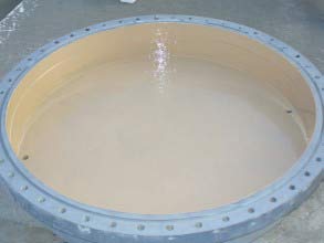 Värmeväxlarens gavel ytbehandlad med Belzona 5811 (Immersion Grade) för långtidsbeständighet mot korrosion