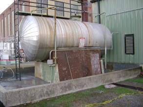 Damaged secondary containment area at a power plant
