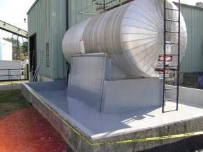Secondary containment area coated for long-term chemical and corrosion protection