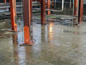 Damaged concrete secondary containment area