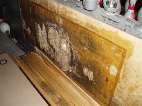 Damaged side plate on the pin deck at a bowling centre